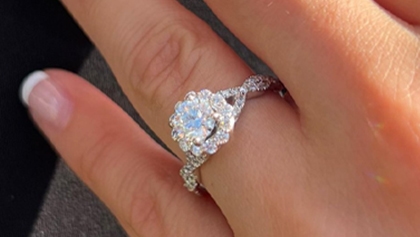 woman wearing a platinum engagement ring