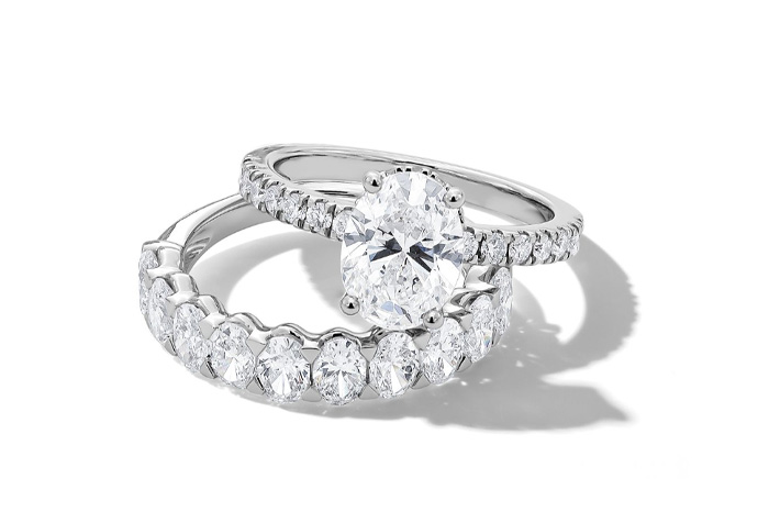 Gold wedding band and engagement ring from Jared