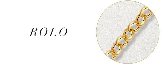 A gold rolo necklace against a white background.