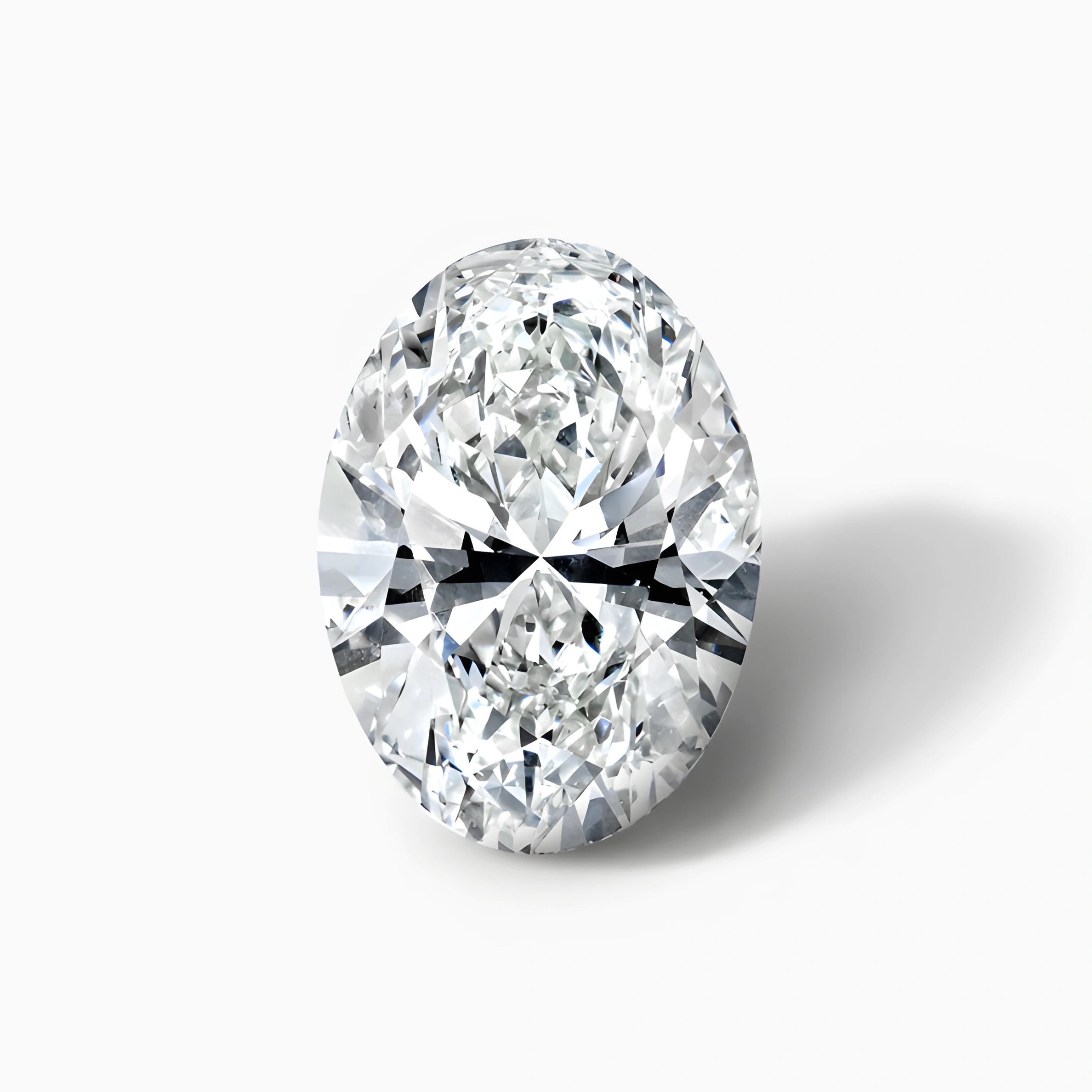 Shop engagement rings with oval center diamonds.