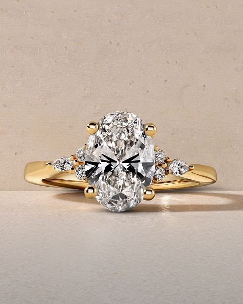 Shop engagement rings with side stones