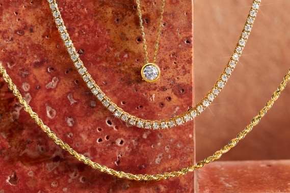 Image of layering necklaces.