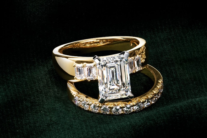 Yellow gold engagement ring and wedding band