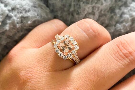 Morganite engagement ring with cushion cut center stone