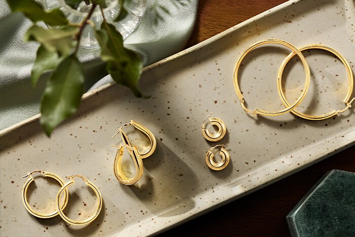 Shop gold hoop earrings from Jared