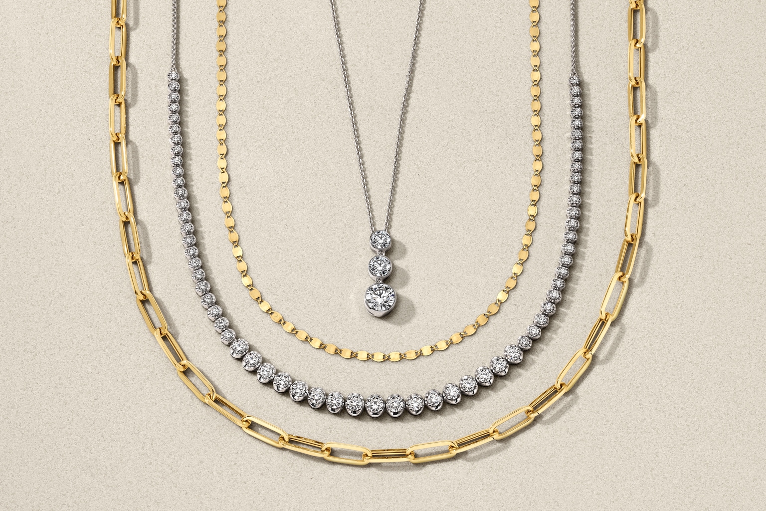 Learn how to style and layer different types of necklaces