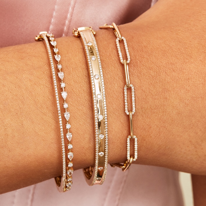 Shy Creation layered bracelets.