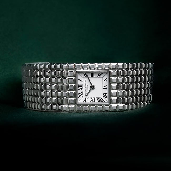 Watch with chain bracelets.