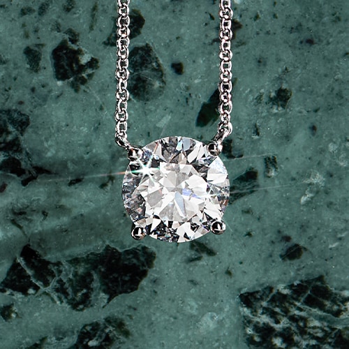 Solitaire white gold necklace