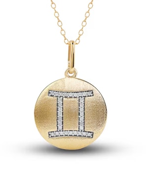 gold pendant with diamond zodiac sign