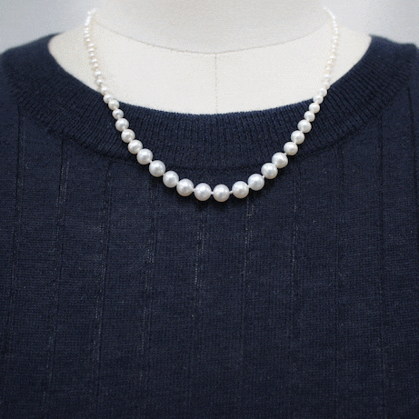 How style Charm'd by Lulu Frost cultured pearl necklace with cultured pearl puffy heart locket charm.