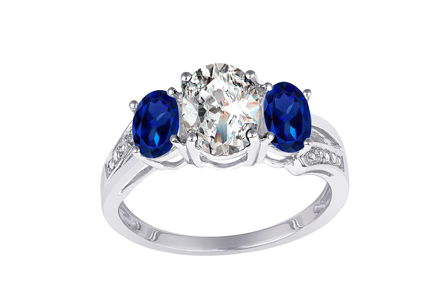 3 stone engagement ring with blue sapphire side stones