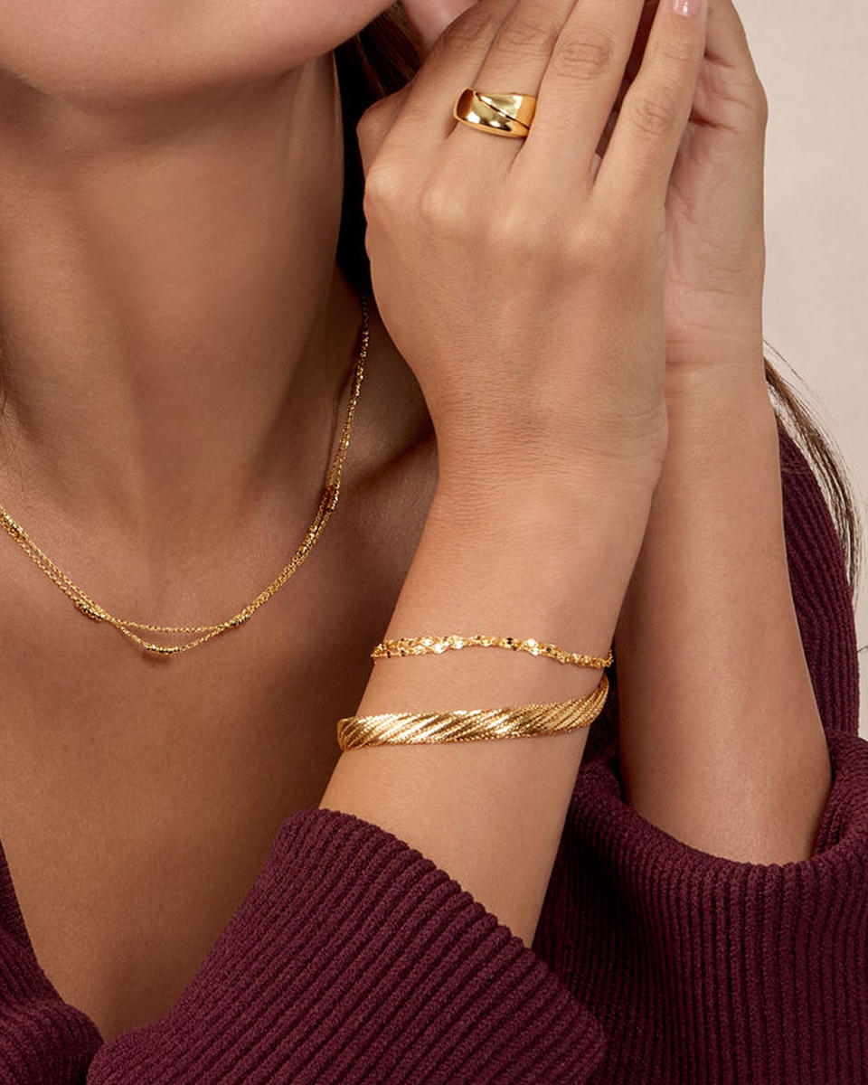 Bracelet stack on arm from Jared