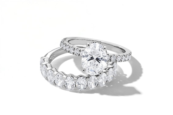 White gold oval engagement ring and matching band